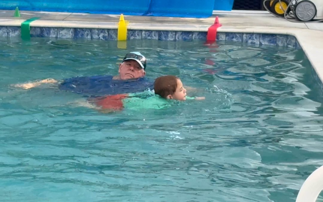 “When he started, he couldn’t swim without a life jacket — now he swims in the ocean!”